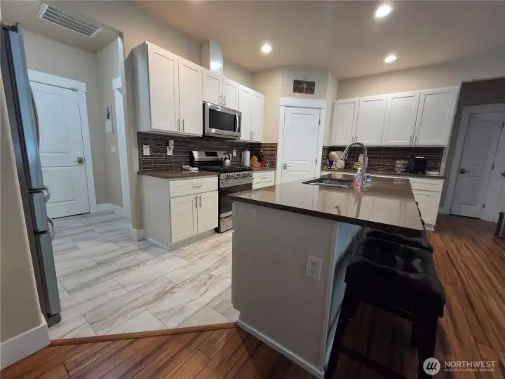 Kitchen with new vinyl tile flooring