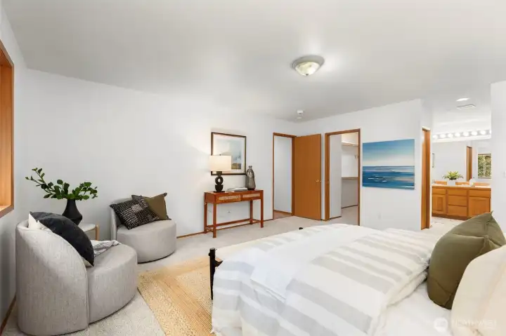 Spacious sitting area in the primary bedroom.