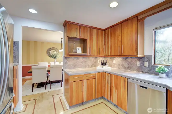 Under-cabinet lighting nicely accents the tile backsplash and offers a soft glow to the kitchen any time of day or night.