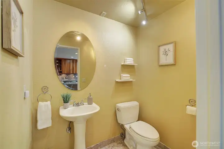 A powder room is featured on the main floor.