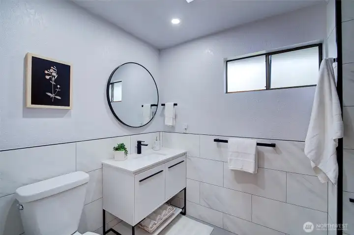 An additional bathroom is featured on the upper floor for the secondary bedrooms.  It's also been updated.