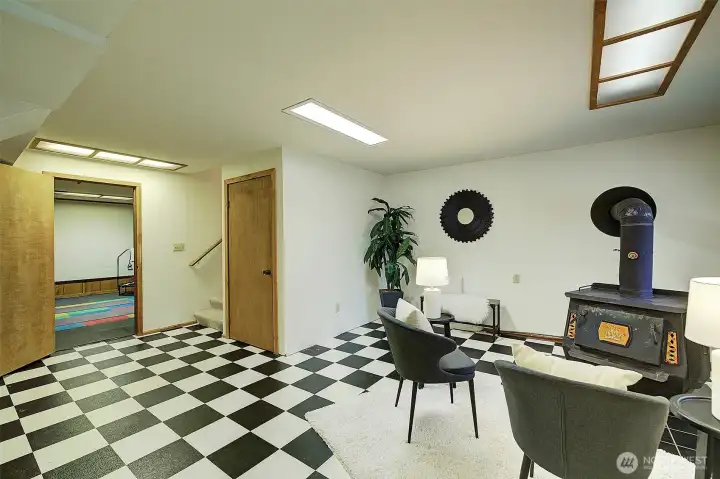 An impressive wood-burning stove can really heat up the basement on cold winter days...and nights!