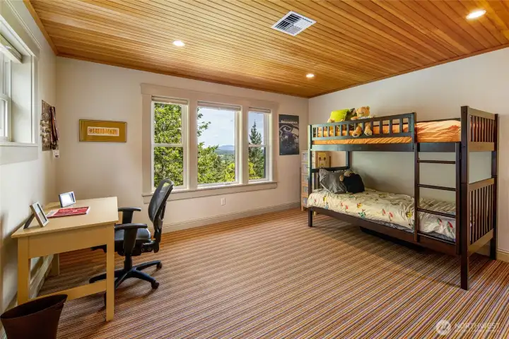 Inviting guest bedroom with island views, ideal for visitors, flex space, or additional living needs.