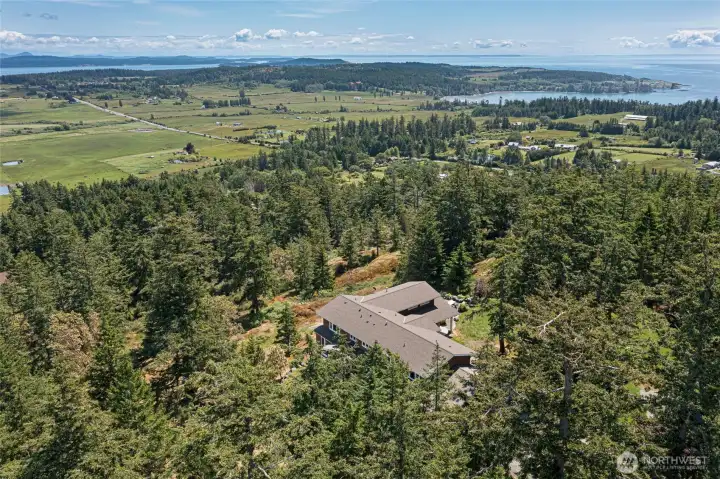 Custom-built Craftsman estate with generous proportions and flexible living spaces, ideal for full-time living or a San Juan Island getaway.
