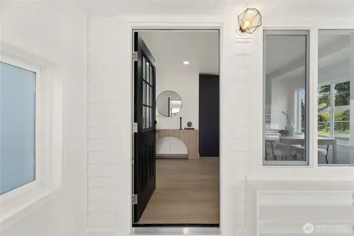 Welcoming entry with sightline into main living area.