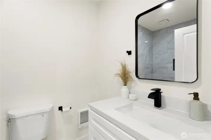 Updated bathroom with modern fixtures and clean finishes.