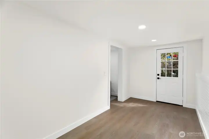 Welcoming entry with open layout and natural light.