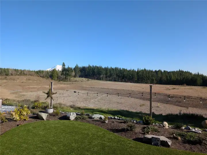 backyard overlooks retention pond and mountain views!