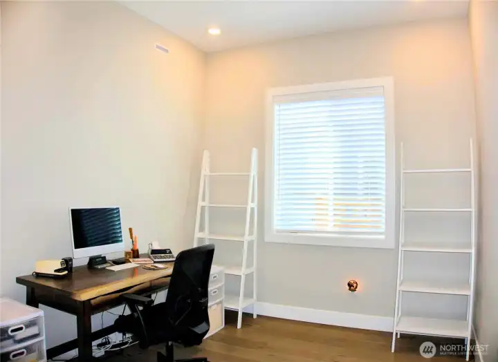 home office or den with door for privacy
