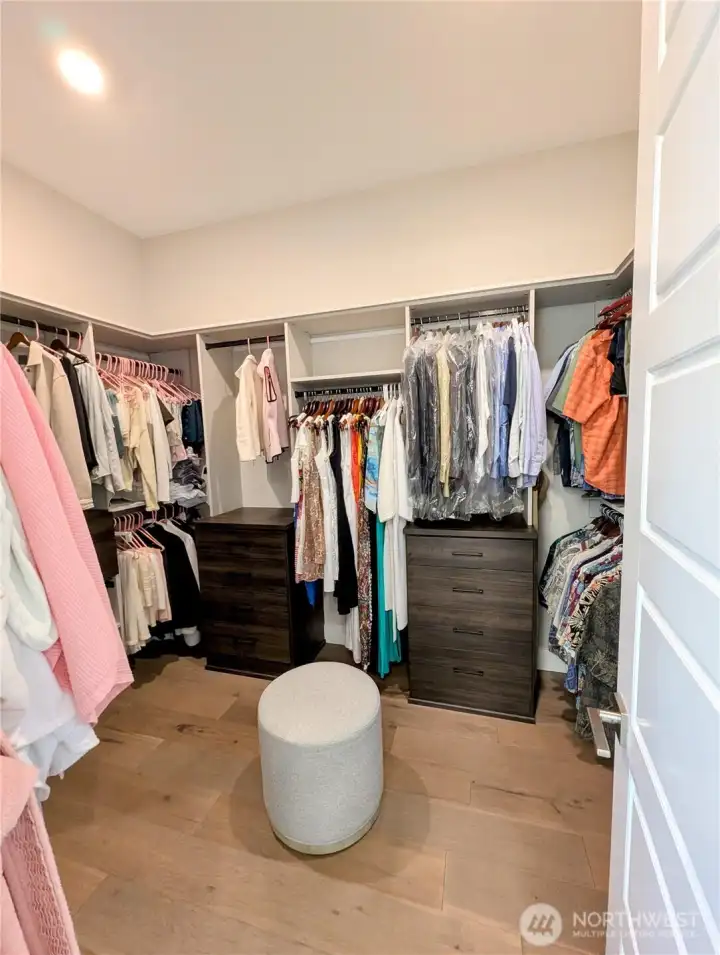 primary closet with custom organization
