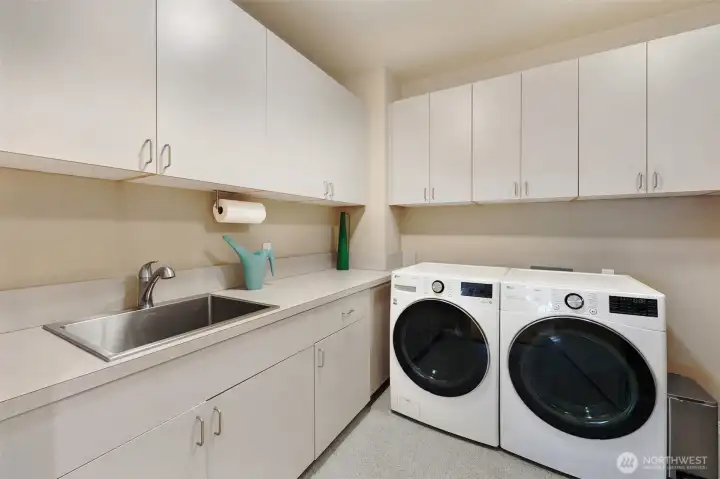 Huge laundry room with ample storage