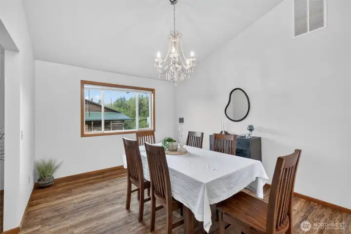 Alternate view of the dining room, with west facing (sunset) pastoral views out the window. Alternate view of the dining room, with west facing (sunset) pastoral views out the window.