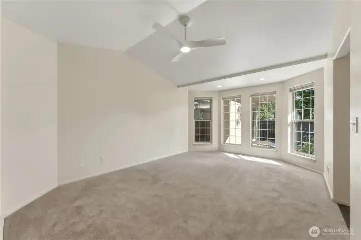 Large Primary Bedroom with Vaulted Ceilings and Ensuite Bathroom