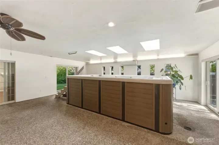 Indoor Spa Retreat with Jacuzzi, Skylights, Mini-Split and Aggregate Flooring