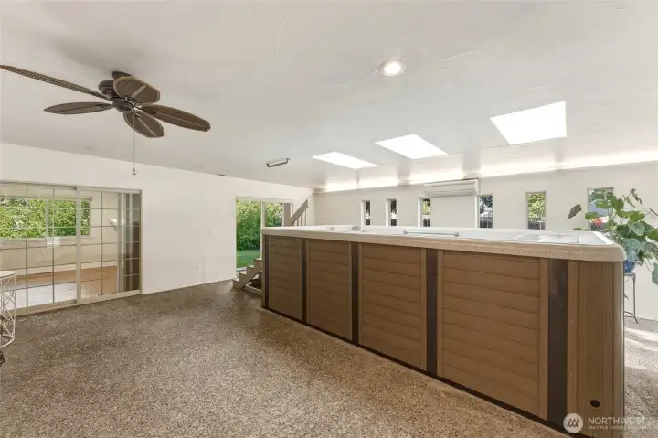 Indoor Spa Retreat with Jacuzzi, Skylights, Mini-Split and Aggregate Flooring
