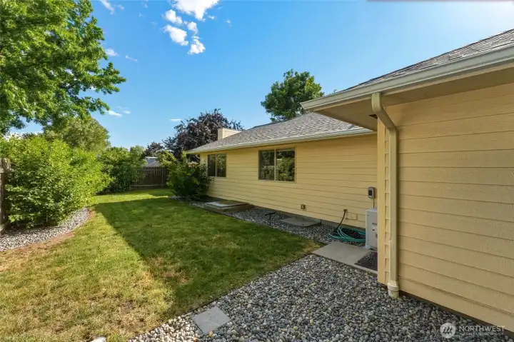 Fully-Fenced Backyard with Low-Maintenance Landscaping, Garage Access & Side Gates