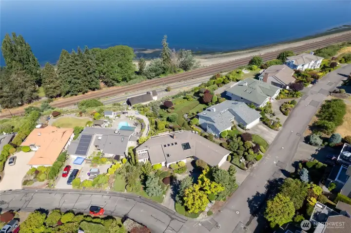 Located directly above Sunnyside beach in the coveted Madrona Park neighborhood. A quick walk takes you right to the beach!