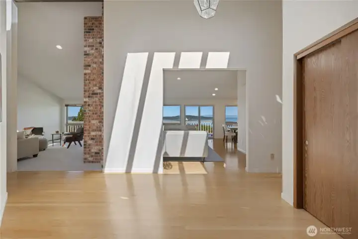 The light-filled entrance greets you with views of the Sound as soon as you step in the front door.