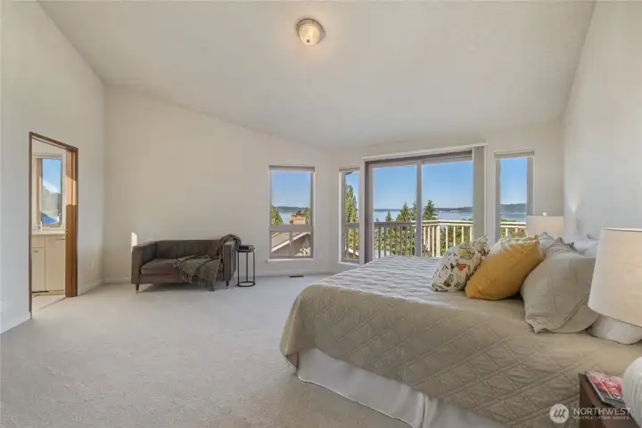 Primary bedroom offers views from your bed, plus a walk-in closet and a 5 piece primary bathroom!
