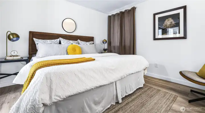 The primary suite has been enhanced by custom closet improvements and a beautifully renovated full bath. The primary suite has been enhanced by custom closet improvements and a beautifully renovated full bath.