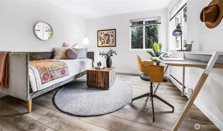 A second ensuite bedroom with updated three-quarter bath provides flexibility for guests, a home office, or both. A second ensuite bedroom with updated three-quarter bath provides flexibility for guests, a home office, or both.