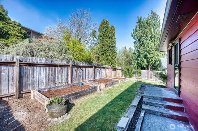 The large side yard is a gardeners delight.