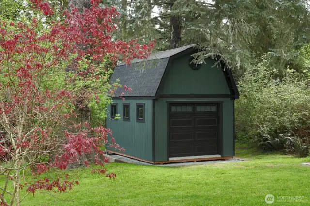 Garden/lawn mower shed.