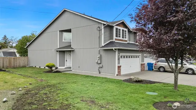 There is room for an RV or boat on either side of  the property.