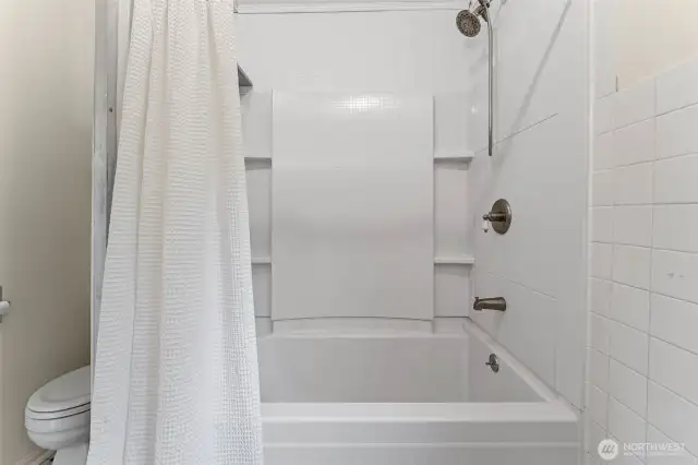 Bathroom with shower and tub