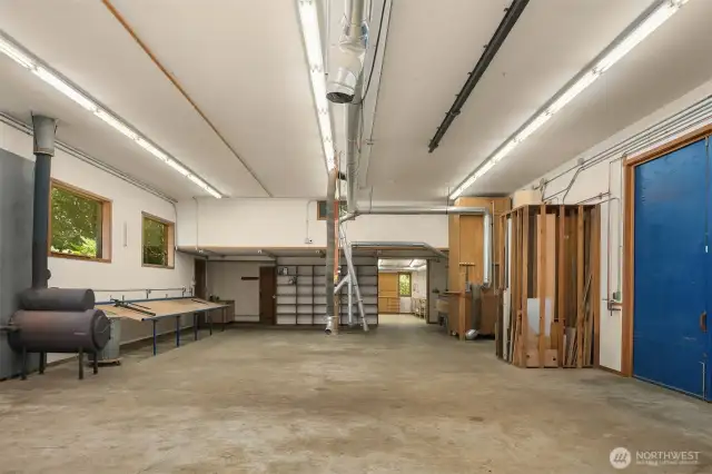 Separately metered from the main home, each shop includes a dedicated 200-amp panel, cozy wood-burning stove, and endless potential for work, storage, or studio space.