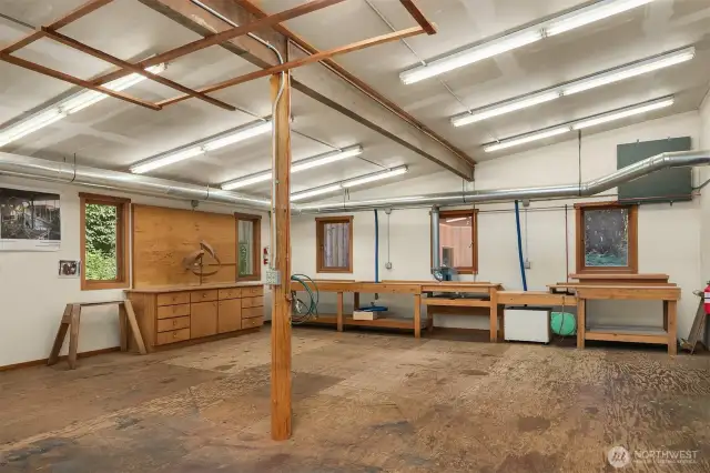 Shop has its own 1/2 bathroom, office, and so much space to create!