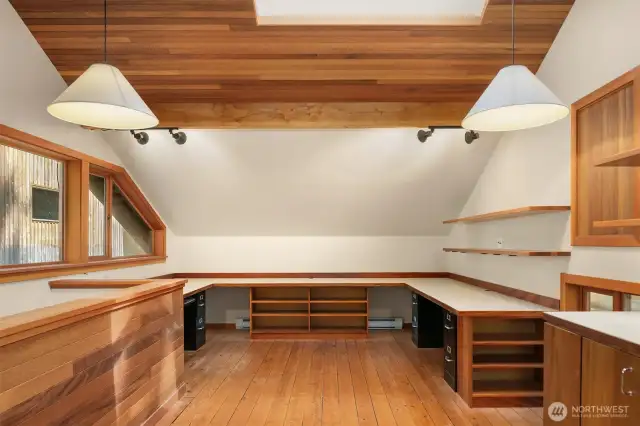 Above the original shop, you'll find 320 sq/ft of finished office space complete with custom built-in desks and file cabinets—ideal for remote work or creative projects.