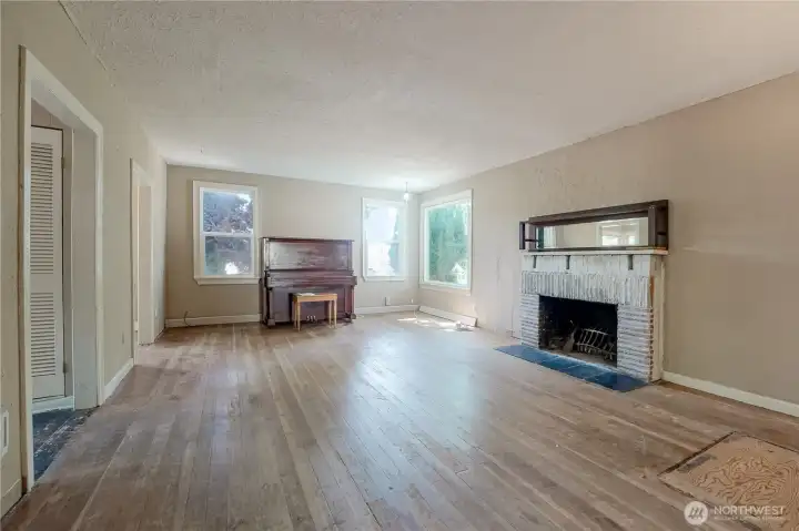Living room - hardwood floors and wood fireplace