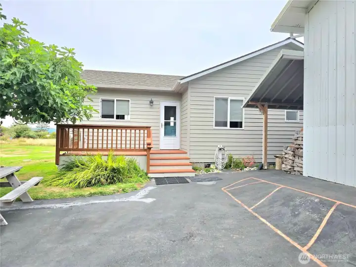 Entrance to home and breezeway to the studio. Entrance to home and breezeway to the studio.