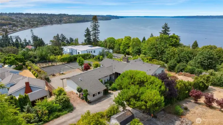 Drone view showing most of the property. Land to the left and the shed appearing at the bottom of the photo is part of this estate.