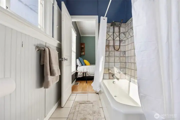 Main Bathroom with connecting door to Primary Bedroom