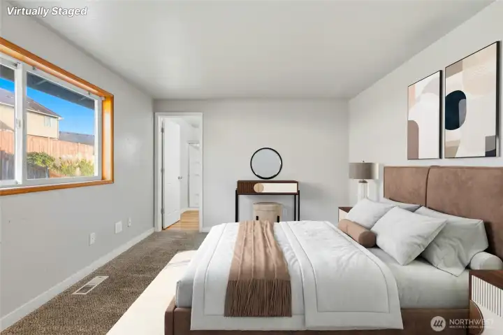 Virtually staged primary suite.