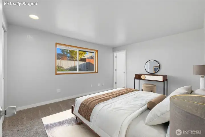 Virtually staged primary suite.