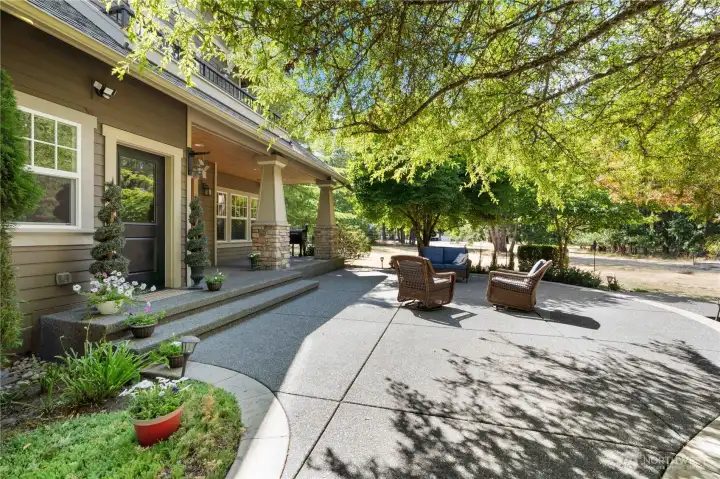 The way the light filters through the trees onto this patio and back porch is magical