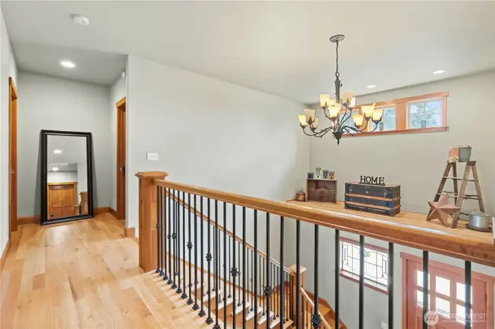 Upstairs features a wide hallway and a 2 story entrance