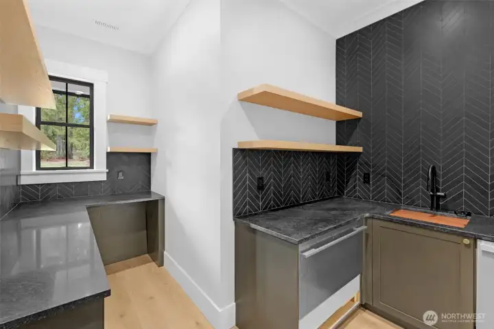 Butler Pantry for prep and storage. Fischer Paykel beverage fridge, 2nd dishwasher and it's designed for a Kegerator :)