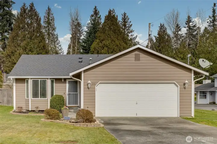 This adorable rambler on a corner lot has been lovingly maintained by the original owners.