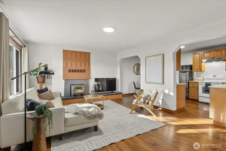Basement living room with its own entrance and wood burning fireplace