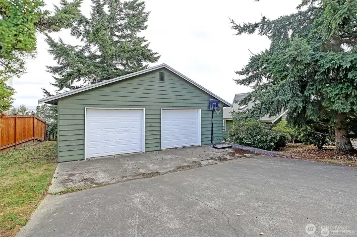 HUGE is the detached 2 car garage w/shop/studiio-flex space attached. Toys, shop....yoga....bunk room??? Lot's of great options to choose from.  HUGE almost 22,000 sq ft lot!