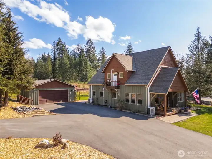 Welcome to the Funky Farm! 4 bedroom home with stunning remodeled chef's kitchen and detached shop!