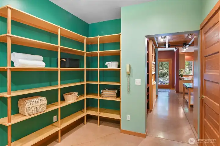 Laundry/mudroom storage and view to main entry foyer.