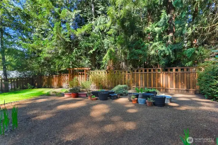 Backyard nursery, gate in fence to the left for full size vehicle access.