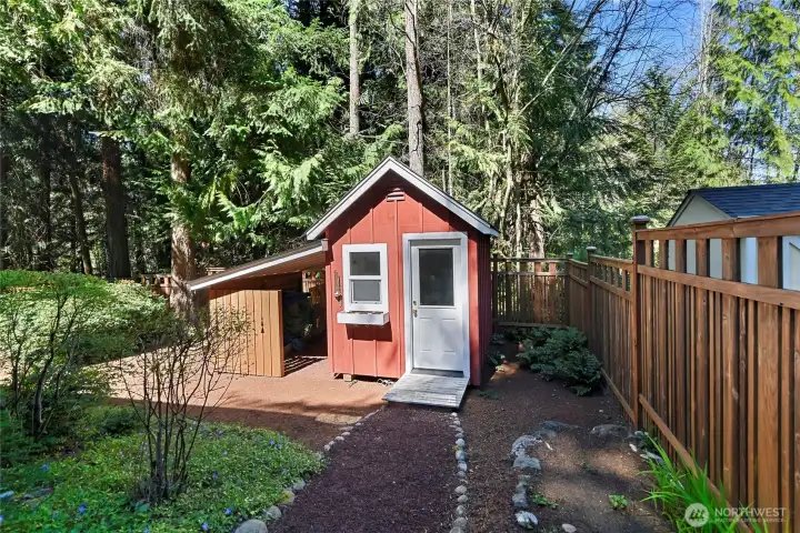 Garden shed and covered port.