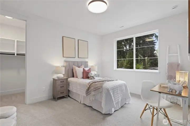 Light-filled bedroom with large picture window. Southerly exposure and plenty of room for a queen size bed plus nightstsands and a walk-in closet.