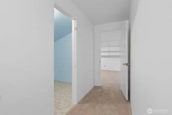 The large storage room to the left would make a great primary bath addition. Maybe even bring the laundry  room upstairs.